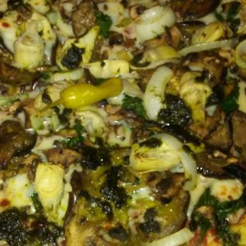 Capital Pizza - Rabbit pizza with red sauce, I asked for none - Pizza Near Me - Lubbock, Texas