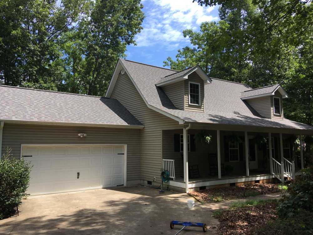 Slide of The Roofing Company