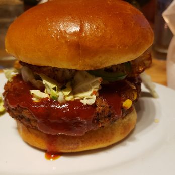 Zinburger - Bruce Lee burger with veggie patty (Asian BBQ sauce, jalapeños, Napa cabbage slaw, Cucumbers, fried egg) - Burgers Near Me - Tucson, Arizona Zinburger - Bruce Lee burger with veggie patty (Asian BBQ sauce, jalapeños, Napa cabbage slaw, Cucumbers, fried egg) - Burgers Near Me - Tucson, Arizona