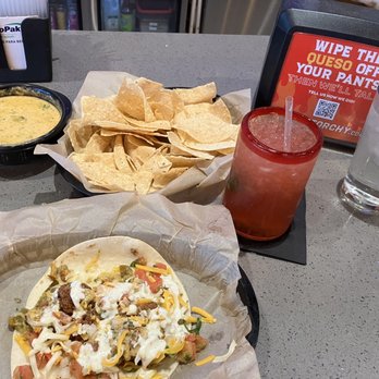 Torchy's Tacos - Trailer Park Taco( extra trashy) queso and chips plus a Tito's Cherry Limeaide! Yum! - Tacos Near Me - Phoenix, Arizona Torchy's Tacos - Trailer Park Taco( extra trashy) queso and chips plus a Tito's Cherry Limeaide! Yum! - Tacos Near Me - Phoenix, Arizona