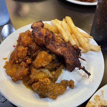 Hibachi Buffet - a plate of food on a table - Buffets Near Me - Lakeland, Florida Hibachi Buffet - a plate of food on a table - Buffets Near Me - Lakeland, Florida