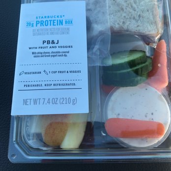 Starbucks - PB&J protein box with half a sandwich carrots cucumbers apples and chocolate covered raisins - Coffee & Tea Near Me - Broken Arrow, Oklahoma