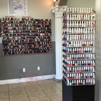 Elegant Nails and Spa - The rack on the wall is regular colors and the one on the right is gel - Nail Salons Near Me - Tampa, Florida Elegant Nails and Spa - The rack on the wall is regular colors and the one on the right is gel - Nail Salons Near Me - Tampa, Florida