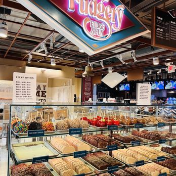 The Fudgery - a display of a variety of donuts - Desserts Near Me - Norfolk, Virginia The Fudgery - a display of a variety of donuts - Desserts Near Me - Norfolk, Virginia