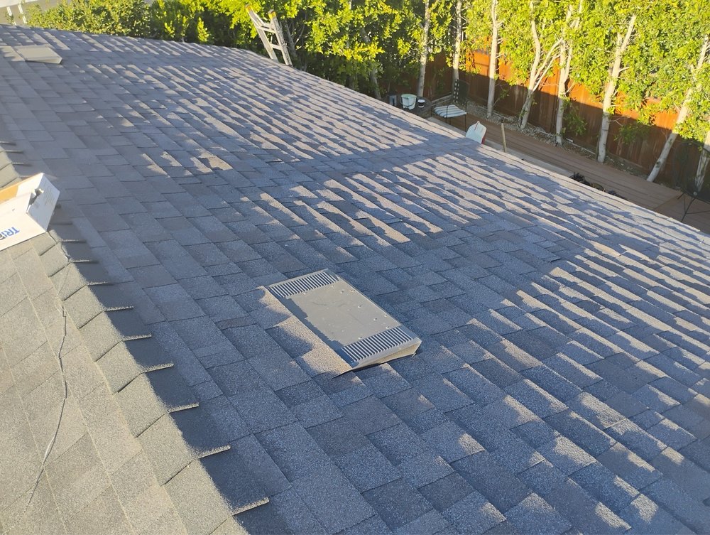 Slide of Kayhan's Roofing