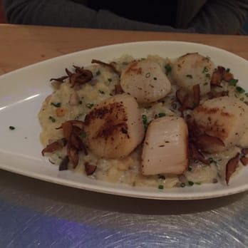 Flying Fish - Seared Sea Scallops with Parmesan risotto and prosciutto cracklins - Seafood Near Me - Orlando, Florida Flying Fish - Seared Sea Scallops with Parmesan risotto and prosciutto cracklins - Seafood Near Me - Orlando, Florida