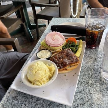 Lazy Lobster Seafood Restaurant - Blackened catch of the day sandwich with side of potato salad. - Seafood Near Me - Key Largo, Florida Lazy Lobster Seafood Restaurant - Blackened catch of the day sandwich with side of potato salad. - Seafood Near Me - Key Largo, Florida
