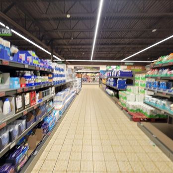 ALDI - Others - Interior view of an ALDI grocery store aisle with shelves on both sides stocked with dairy, personal care, and household items. - Grocery Near Me - Exton, Pennsylvania