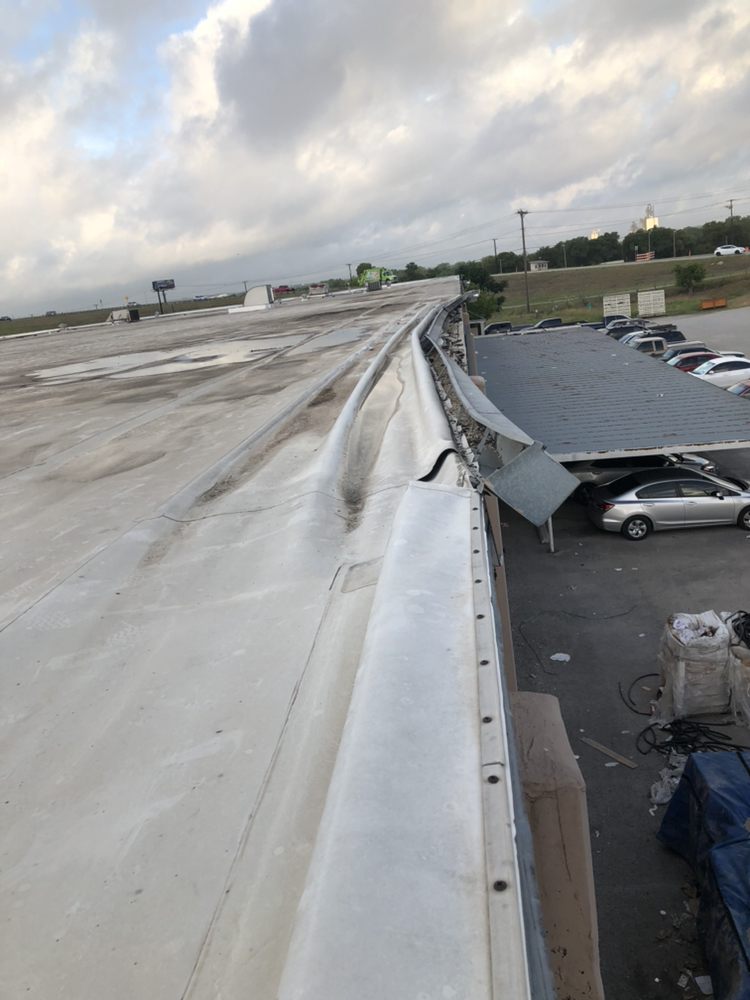 Slide of Rooftop Restoration
