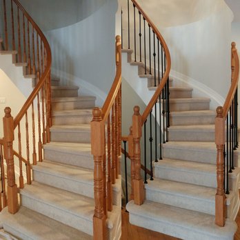 MMM Carpentry - Colonial balusters were replaced with a plain black metal balusters with decorative shoes. - Carpenters Near Me
