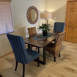 Solid wood table. And chairs al bought at Jackalope   Dori was great in helping us. Wall mirror was bought their too