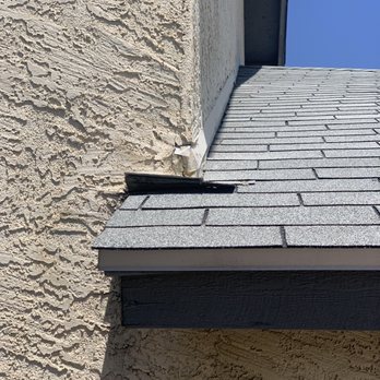 German Roofing - Shingle loose and sticking up. They didn't even look at it let alone attempt to seal it as agreed in the deal - Roofing Near Me - Mesa, Arizona