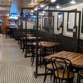 Spaghettini Pizza Trattoria - Table seating (indoor), booths available as well - Pizza Near Me - Mineola, New York
