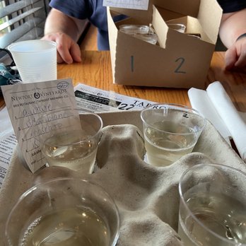 Taproot Brewing Co. - Wine flight in the front and beer flight in the back - Brewpubs Near Me - Middletown, Rhode Island