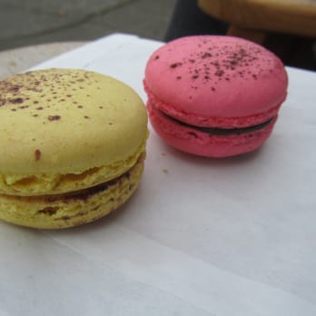 Rosellini's - Left: Passionfruit Milk Chocolate macaron. Right: Dark Chocolate Chili macaron ($1.90) - Bakeries Near Me - Seattle, Washington Rosellini's - Left: Passionfruit Milk Chocolate macaron. Right: Dark Chocolate Chili macaron ($1.90) - Bakeries Near Me - Seattle, Washington