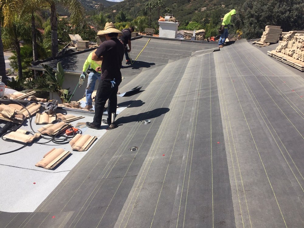 Slide of PC Roofing Services