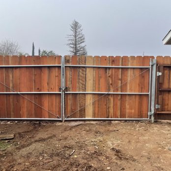 Al's Landscape Construction - Beautiful redwood installed over steel frame to ensure heft and stability. Personnel service gate installed on the right side. - Landscaping Near Me - Fresno, California Al's Landscape Construction - Beautiful redwood installed over steel frame to ensure heft and stability. Personnel service gate installed on the right side. - Landscaping Near Me - Fresno, California