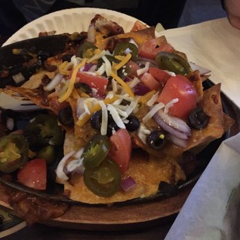 Turtle Bay - Nachos, personally I like my cheese completely melted, but my boyfriend devoured these all by himself. - Pizza Near Me - New Orleans, Louisiana Turtle Bay - Nachos, personally I like my cheese completely melted, but my boyfriend devoured these all by himself. - Pizza Near Me - New Orleans, Louisiana