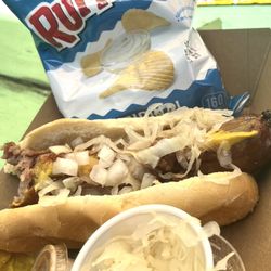 R&R Pub n Grub - My yummy bratwurst with side of sauerkraut, fresh diced onions, and a side of their chili and bag of chips.