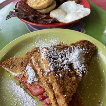 Cafe Rae - Stuffed, crusted French toast, and 2 egg plate w/ scratch made English muffin. Delicious. - Breakfast & Brunch Near Me - San Clemente, California
