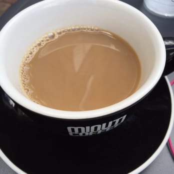 Minuti Coffee - The regular coffee with a splash of soy milk (which they didn't charge for :)). - Coffee & Tea Near Me - Houston, Texas Minuti Coffee - The regular coffee with a splash of soy milk (which they didn't charge for :)). - Coffee & Tea Near Me - Houston, Texas