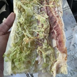 Jimmy John's - Brown old shredded lettuce on Club Lulu. They delivered this for lunch.