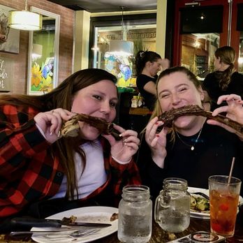 Emberz - My wife and her friend eating tomahawk steaks! - Wine Bars Near Me - Sonora, California