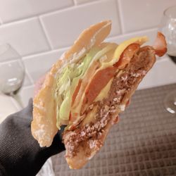 AM PM - THE AK 47 BURGER BACON SMOKE SAUSAGE CHEESE, LETTUCE & TOMATOE HOMEMADE BEEF PATTY
