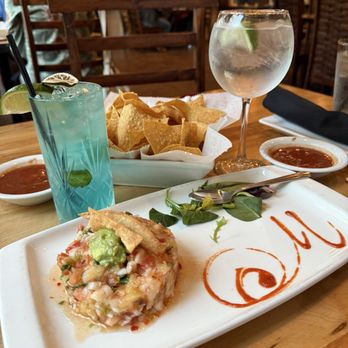 Villa Montez - Beautiful and excellent Shrimp ceviche with a blue coconut mojito and Topo Chico. - Latin American Near Me - Tyler, Texas Villa Montez - Beautiful and excellent Shrimp ceviche with a blue coconut mojito and Topo Chico. - Latin American Near Me - Tyler, Texas