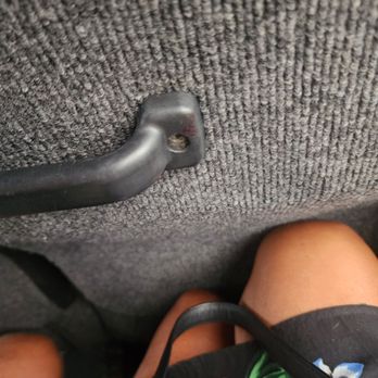 Travel To Key West - Picture of my knees scrunched up by broken seat in front of me. Switched seats couple times, many were stuck in reclined position. - Bus Tours Near Me Travel To Key West - Picture of my knees scrunched up by broken seat in front of me. Switched seats couple times, many were stuck in reclined position. - Bus Tours Near Me