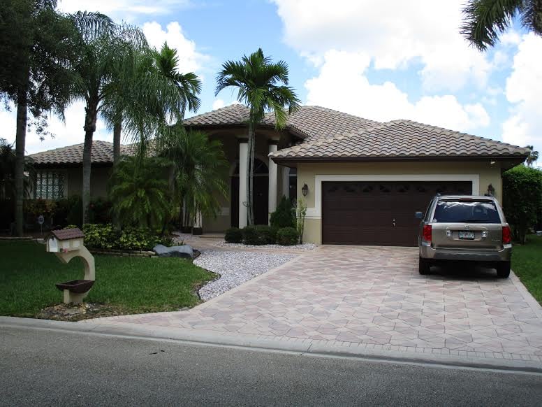 Slide of Heron Bay Roofing