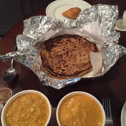 KadhI pakora (left), shahi paneer (right), aloo paratha, and vegetable samosa. All super delicious.