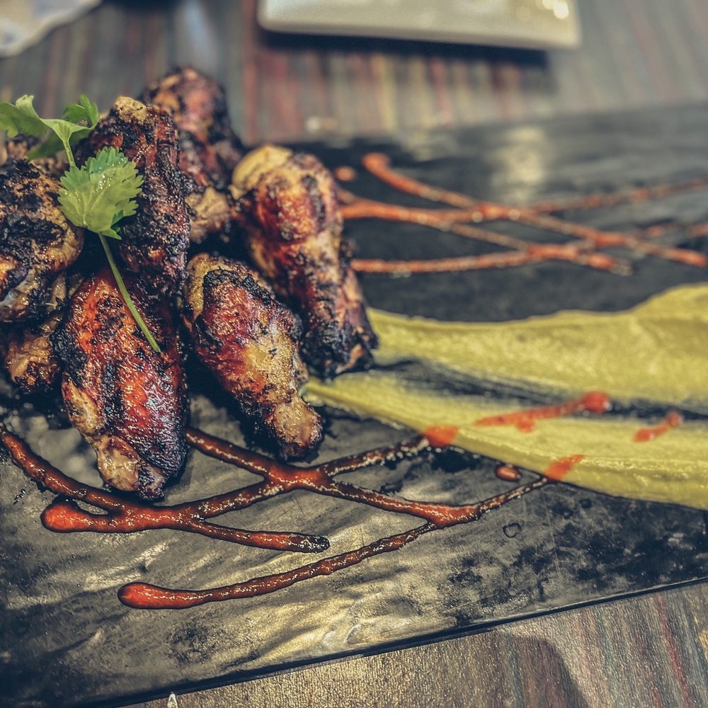 Sisserou's Caribbean Restaurant & Catering - Jerk Chicken Wings - Caribbean Near Me - Tulsa, Oklahoma Sisserou's Caribbean Restaurant & Catering - Jerk Chicken Wings - Caribbean Near Me - Tulsa, Oklahoma