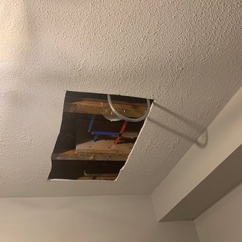 Xpress Maintenance & Remodeling - Hole cut in basement ceiling to plumb bathtub. - General Contractors Near Me Xpress Maintenance & Remodeling - Hole cut in basement ceiling to plumb bathtub. - General Contractors Near Me