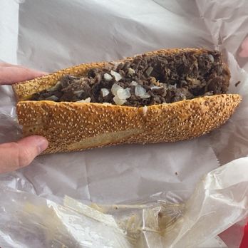 Tony and Nick's Steaks - Whiz Wit with fried onions on Seeded roll - Sandwiches Near Me - Philadelphia, Pennsylvania Tony and Nick's Steaks - Whiz Wit with fried onions on Seeded roll - Sandwiches Near Me - Philadelphia, Pennsylvania