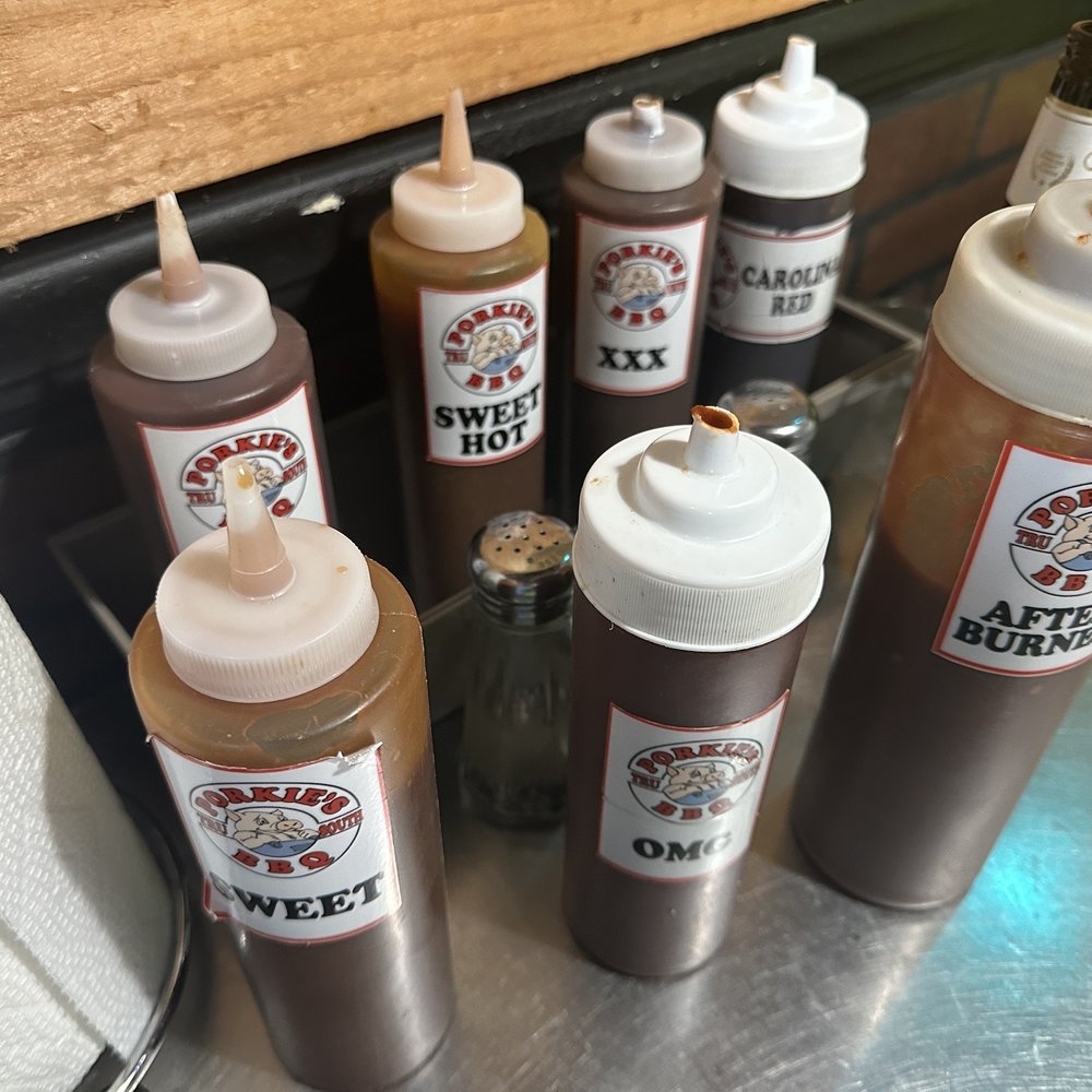 Porkies BBQ - a variety of ketchup bottles - Barbeque Near Me - DeLand, Florida Porkies BBQ - a variety of ketchup bottles - Barbeque Near Me - DeLand, Florida