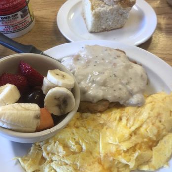 Longwood Country Kitchen - Country Fried Steak with 2 eggs, cup of fresh fruit and a biscuit - Breakfast & Brunch Near Me - Longwood, Florida Longwood Country Kitchen - Country Fried Steak with 2 eggs, cup of fresh fruit and a biscuit - Breakfast & Brunch Near Me - Longwood, Florida