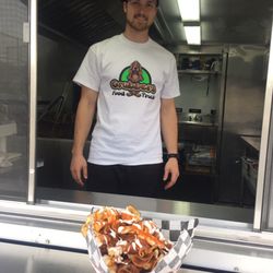Grubbers Food Truck - Leesburg Grubbers Food Truck owner serving their Buffalo Ribbon Chips.