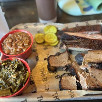 The Bone - Beef Brisket and St. Louis Ribs with a side of Collard Greens and Baked Beans. - Barbeque Near Me - Manassas, Virginia The Bone - Beef Brisket and St. Louis Ribs with a side of Collard Greens and Baked Beans. - Barbeque Near Me - Manassas, Virginia