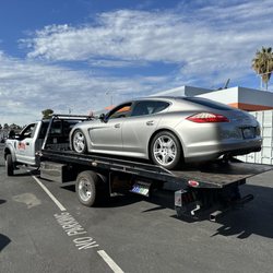A-1 Road Service - Car being towed.