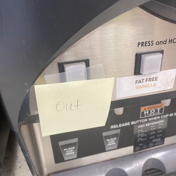 Casey's - a parking meter with a note stuck to it - Pizza Near Me - Hannibal, Missouri