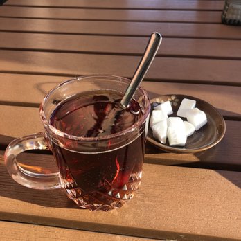 Tah Deeg Persian Cuisine - Delicious hot chai, served with lump sugar. - Persian/Iranian Near Me - Clovis, California Tah Deeg Persian Cuisine - Delicious hot chai, served with lump sugar. - Persian/Iranian Near Me - Clovis, California