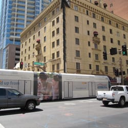 METRO light rail - METRO light rail rolls past the Hotel San Carlos in downtown Phoenix.