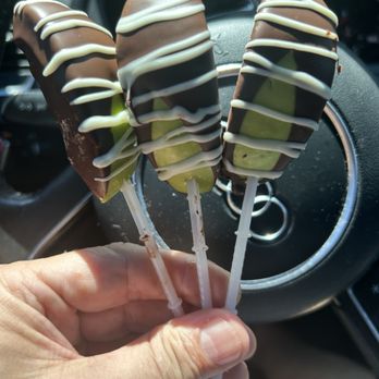Edible Arrangements - Three chocolate covered granny smith apple slices. - Gift Shops Near Me - Jacksonville, Florida Edible Arrangements - Three chocolate covered granny smith apple slices. - Gift Shops Near Me - Jacksonville, Florida