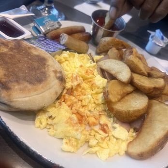 Ocean Blue Restaurant & Lounge - Scrambled eggs, sausage link, potatoes and English muffins. - New American Near Me - Myrtle Beach, South Carolina