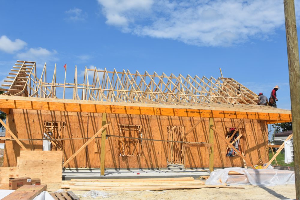 Slide of People's Choice Roofing