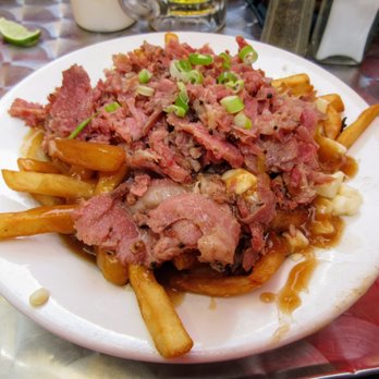La Baraque du Vieux St-Vincent - Montreal poutine. French fries, smoked meat, cheese curds and gravy. $12.99. - Pizza Near Me - Montreal, Quebec