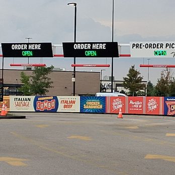 Portillo's Pick Up Joliet - The drive thru has a racing motif, but it's not exactly NASCAR speedy - Burgers Near Me - Joliet, Illinois Portillo's Pick Up Joliet - The drive thru has a racing motif, but it's not exactly NASCAR speedy - Burgers Near Me - Joliet, Illinois