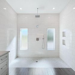 Tom and Lynn's job this is a curb less shower main floor and shower floor are the same height one of my favorites.