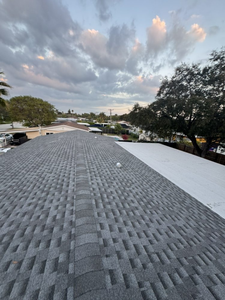 Slide of SM Roofing Service